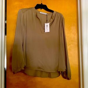 . Length from shoulder to hem:23.5 inches, bust 21”, sleeve 22”.